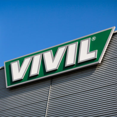 Geschichte Heute VIVIL Logo an Hausfasade